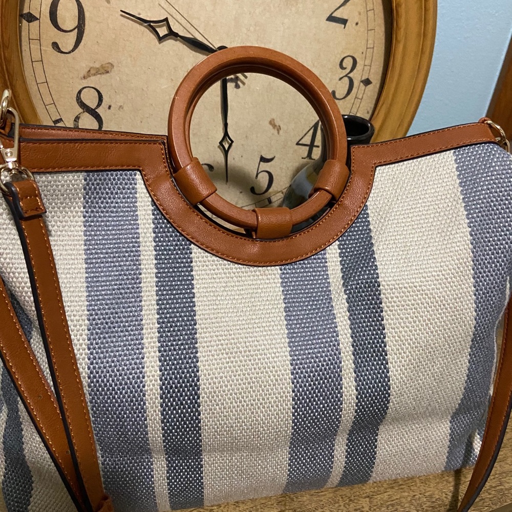 Tote bag with circular handle.  Pre owned.
